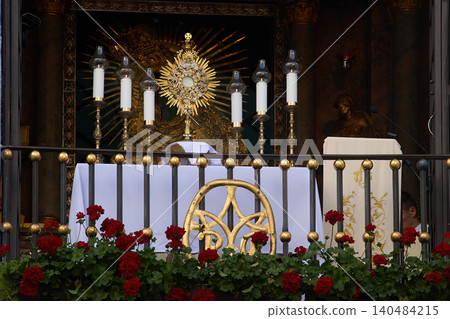 Adoration of the blessed sacrament at catholic altar Adoration of the blessed sacrament at catholic altar 140484215