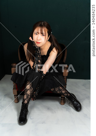 Woman in Gothic Lolita attire Woman in Gothic Lolita attire 140484235