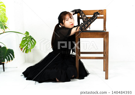 Woman in Gothic Lolita attire Woman in Gothic Lolita attire 140484393