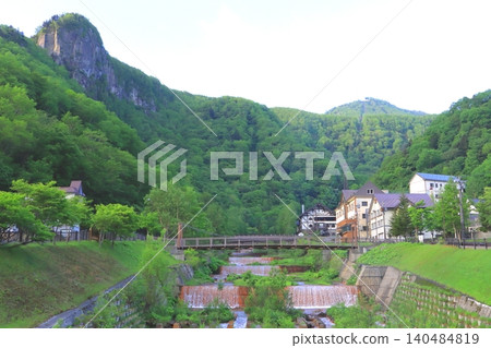 Sounkyo Onsen (Kurodakezawa River, Kamikawa Town, Hokkaido) in the fresh green of spring Sounkyo Onsen (Kurodakezawa River, Kamikawa Town, Hokkaido) in the fresh green of spring 140484819