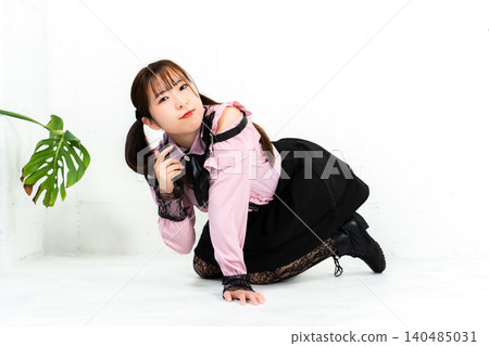 Woman in idol costume Woman in idol costume 140485031