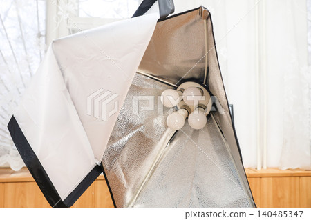Inspection and repair of lighting equipment in a professional photo studio Inspection and repair of lighting equipment in a professional photo studio 140485347