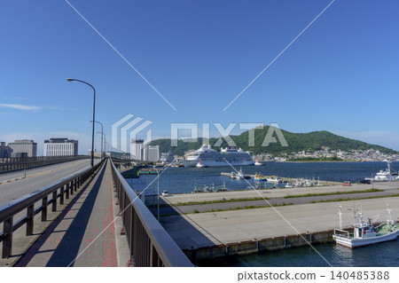 Hakodate Port and Mount Hakodate as seen from Hakodate Tomoe Bridge: A harbor landscape of Hakodate, Hokkaido. Hakodate Port and Mount Hakodate as seen from Hakodate Tomoe Bridge: A harbor landscape of Hakodate, Hokkaido. 140485388