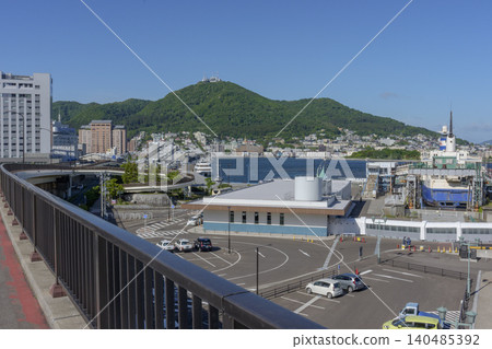 Hakodate Port and Mount Hakodate as seen from Hakodate Tomoe Bridge: A harbor landscape of Hakodate, Hokkaido. Hakodate Port and Mount Hakodate as seen from Hakodate Tomoe Bridge: A harbor landscape of Hakodate, Hokkaido. 140485392