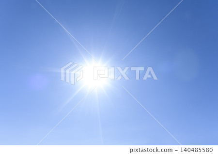 Sun and sunbeams shining in the early summer blue sky - Yokohama background image Sun and sunbeams shining in the early summer blue sky - Yokohama background image 140485580
