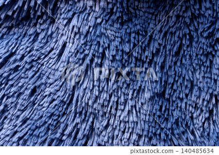 Deep blue fabric texture with soft textured fibers close up Deep blue fabric texture with soft textured fibers close up 140485634