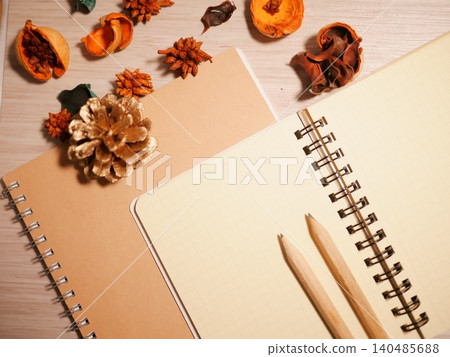 Sketchbook and fallen leaves Sketchbook and fallen leaves 140485688