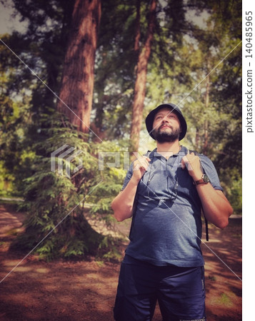 man with backpack travelling in rainforest man with backpack travelling in rainforest 140485965