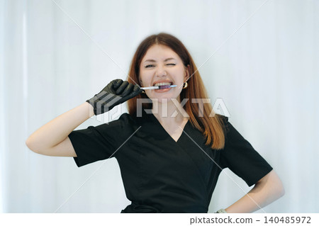 skilled aesthetician woman professional wearing black medical suit holding syringes skilled aesthetician woman professional wearing black medical suit holding syringes 140485972