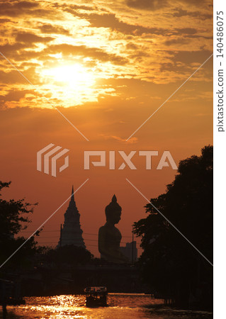 Evening scenes of the Phra Phutthathamakaya Thepmongkol at Wat Pak Nam is a Buddha statue. It is the tallest Buddha statue in Bangkok and the third tallest in Thailand. Evening scenes of the Phra Phutthathamakaya Thepmongkol at Wat Pak Nam is a Buddha statue. It is the tallest Buddha statue in Bangkok and the third tallest in Thailand. 140486075