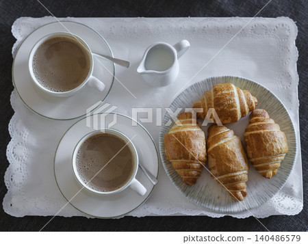 breakfast with coffee and croissant in hotel room breakfast with coffee and croissant in hotel room 140486579