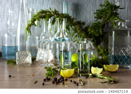 Glasses with Gin on a table in bar. Glasses with Gin on a table in bar. 140487219