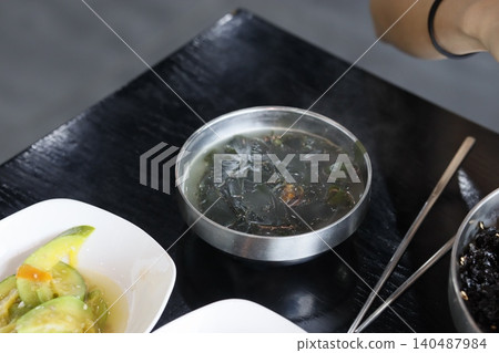 Korean Meal with Seaweed Soup and Side Dishes Korean Meal with Seaweed Soup and Side Dishes 140487984