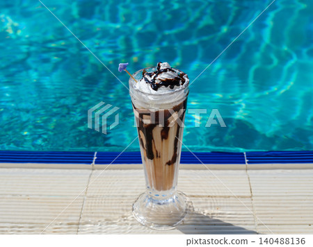 delicious cold coffee by the pool 140488136