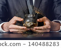 Holding wealth in a glass jar 140488283
