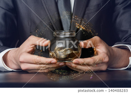Holding wealth in a glass jar Holding wealth in a glass jar 140488283