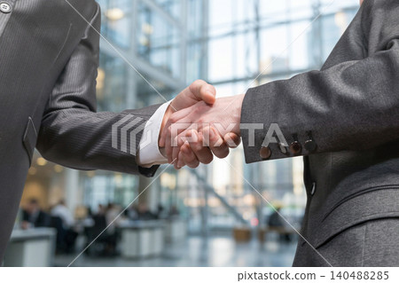 Partners close deal Partners close deal 140488285