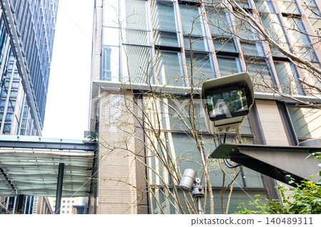 Surveillance cameras around the building Surveillance cameras around the building 140489311