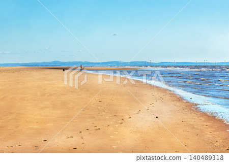 Dunes in sunrays with small hills of sand - summer begin for rel Dunes in sunrays with small hills of sand - summer begin for rel 140489318