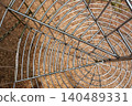 Point of view inside metal mesh tunnel at adventure park 140489331