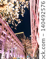 The spring night view of Nihonbashi, illuminated with cherry blossoms and featuring historical architecture. 140492576