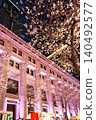 The spring night view of Nihonbashi, illuminated with cherry blossoms and featuring historical architecture. 140492577