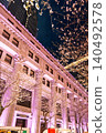 The spring night view of Nihonbashi, illuminated with cherry blossoms and featuring historical architecture. 140492578