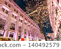 The spring night view of Nihonbashi, illuminated with cherry blossoms and featuring historical architecture. 140492579