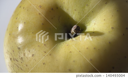 Still life photograph of a yellow Japanese pear Still life photograph of a yellow Japanese pear 140493004