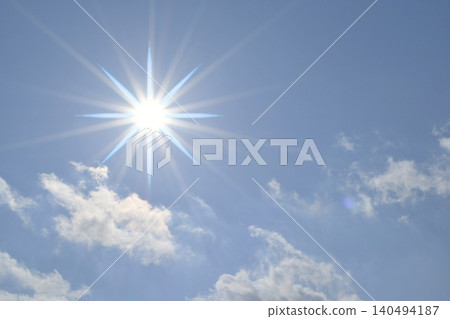 Blue sky and sun, direct sunlight, free space image Blue sky and sun, direct sunlight, free space image 140494187