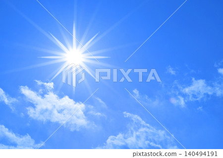 Blue sky and sun, direct sunlight, free space image Blue sky and sun, direct sunlight, free space image 140494191