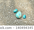 Natural Blue Larimar Gemstone Cabochons on Textured Stone Background 140494345