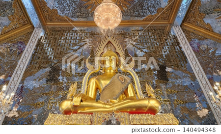 Golden Buddha Statue in Radiant Mirror Mosaic Temple in Thailand Golden Buddha Statue in Radiant Mirror Mosaic Temple in Thailand 140494348