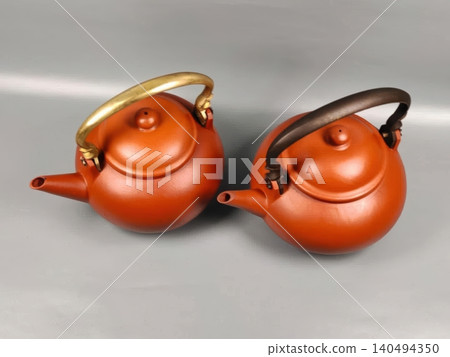 Two Traditional Chinese Yixing Clay Teapots with Metallic Handles 140494350