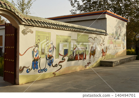 Paintings depicting life on the wall in the Kuche Palace, is famous as the residence of the last patriotic prince, China. Paintings depicting life on the wall in the Kuche Palace, is famous as the residence of the last patriotic prince, China. 140494701