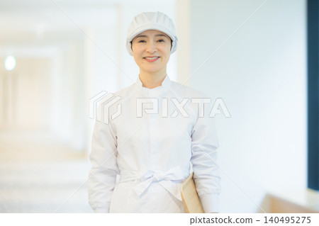Part-time staff working in white coats Part-time staff working in white coats 140495275