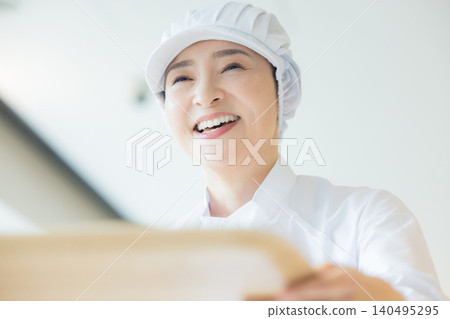 Part-time staff working in white coats Part-time staff working in white coats 140495295