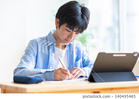 Junior high school students studying at home Junior high school students studying at home 140495465