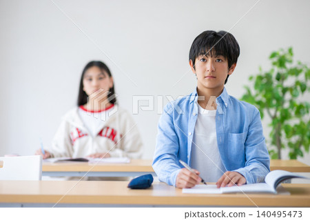 Junior high school students studying in a cram school Junior high school students studying in a cram school 140495473