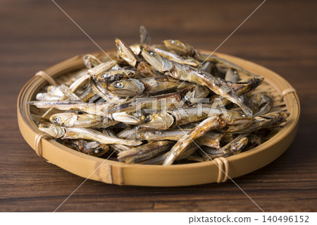 Dried sardines served in a basket Dried sardines served in a basket 140496152