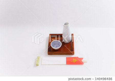 A Shinto ritual image featuring celebratory sake and Japanese tableware. A Shinto ritual image featuring celebratory sake and Japanese tableware. 140496486