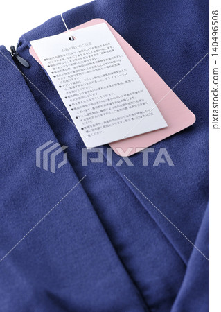 Clothes with price tags still attached Clothes with price tags still attached 140496508