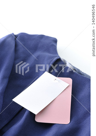 Clothes with price tags still attached 140496546