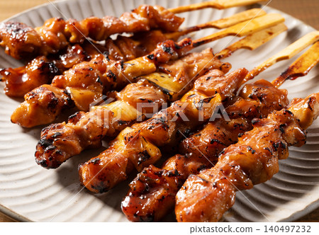 Ultra-macro shot of yakitori sauce served on a Japanese plate. (Izakaya menu/gourmet advertising material) Ultra-macro shot of yakitori sauce served on a Japanese plate. (Izakaya menu/gourmet advertising material) 140497232