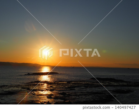 The rising sun over the sea is invigorating. Background, copy space, full of blessings. The rising sun over the sea is invigorating. Background, copy space, full of blessings. 140497427