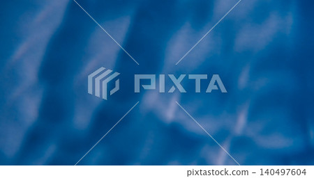 Defocused blue light. Lens flare. Blur vivid color radiant optical flicker illuminated flash leak on abstract luminous background. Defocused blue light. Lens flare. Blur vivid color radiant optical flicker illuminated flash leak on abstract luminous background. 140497604