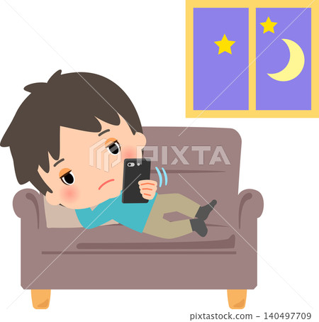A young man staying up late playing on his smartphone. A young man staying up late playing on his smartphone. 140497709