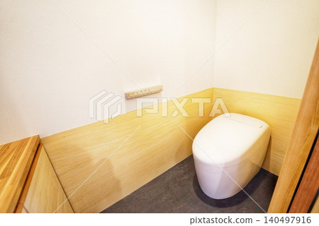 Bright and clean new house toilet 140497916
