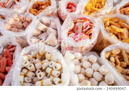 Processed fish products lined up in a Taiwanese market Processed fish products lined up in a Taiwanese market 140499047