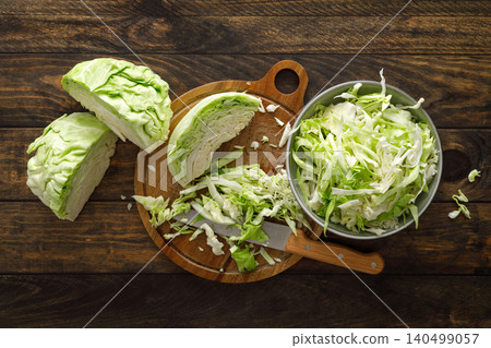 Cabbage cut and shredded. Fresh raw white chopped Cabbage Cabbage cut and shredded. Fresh raw white chopped Cabbage 140499057
